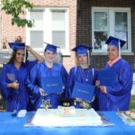 Group of people wearing blue color dress