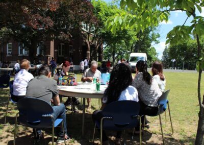 A group of people sitting at a table.