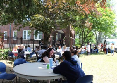 A group of people sitting at a table.