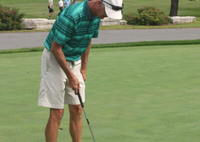 A man on a golf course.