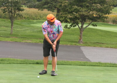 A man on a golf course.