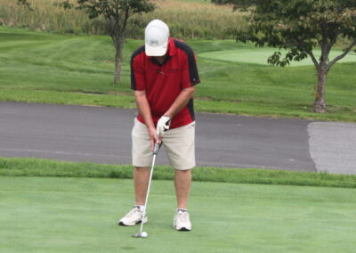 A man on a golf course.