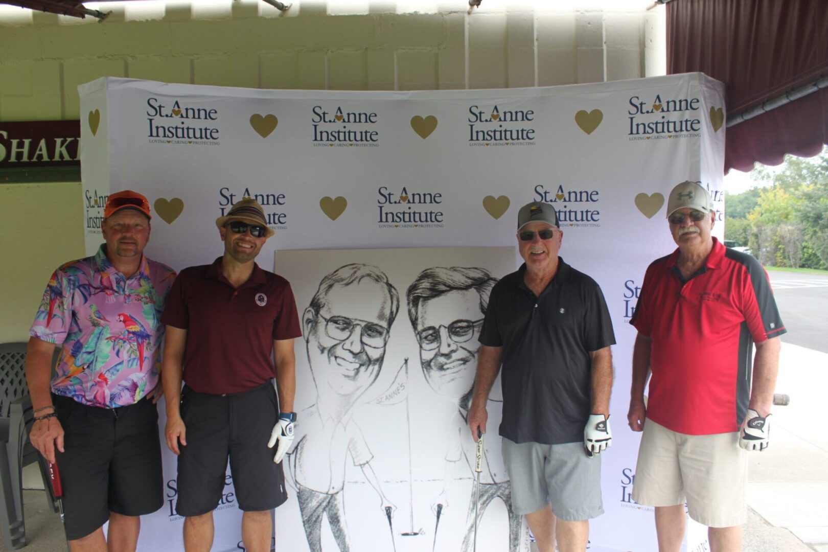 A group of men standing in front of a caricature.