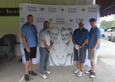 A group of men posing for a picture.