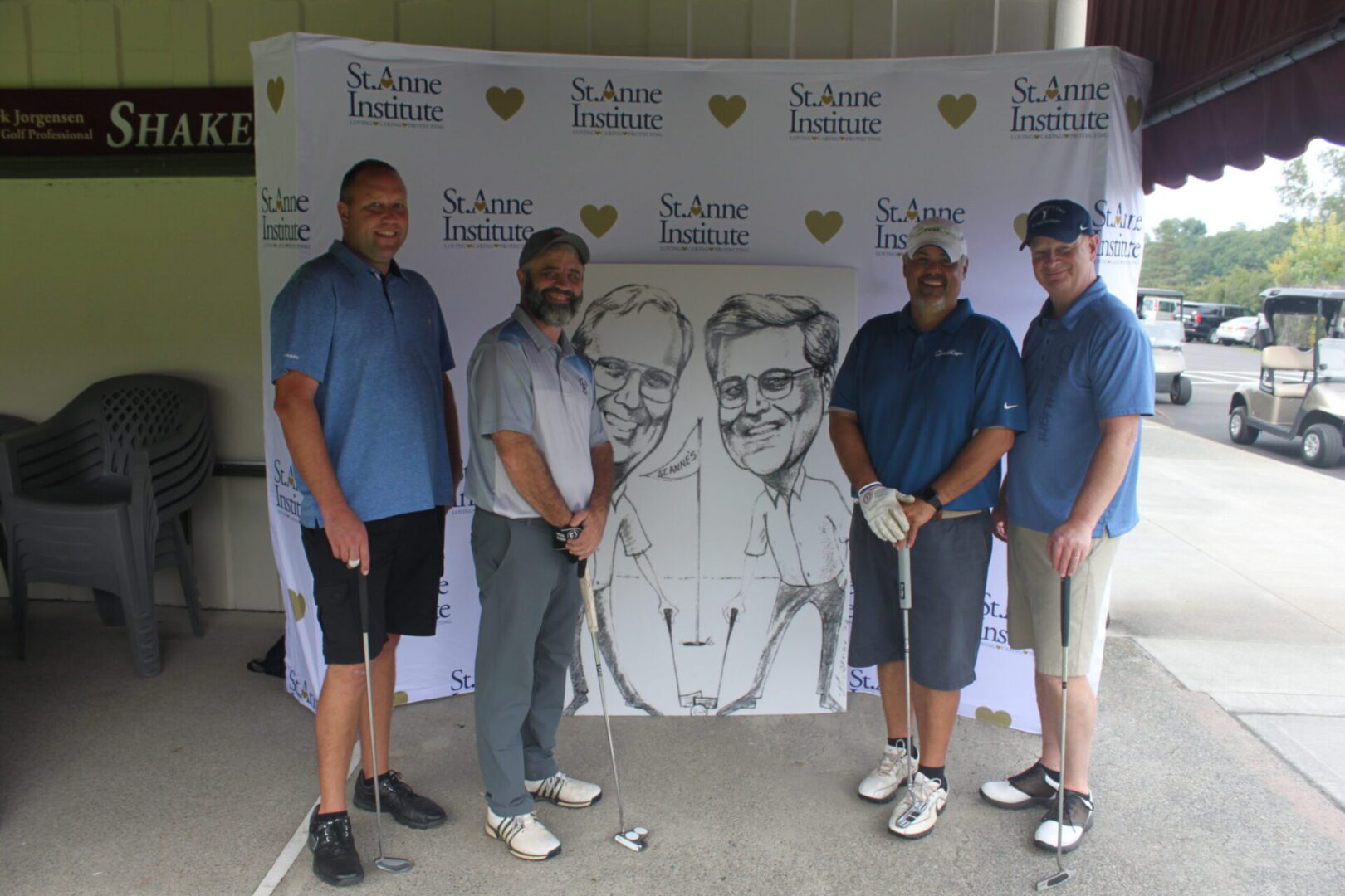 A group of men posing for a picture.