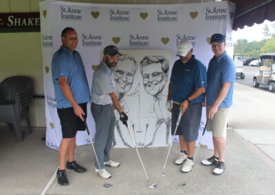 A group of men posing for a picture.