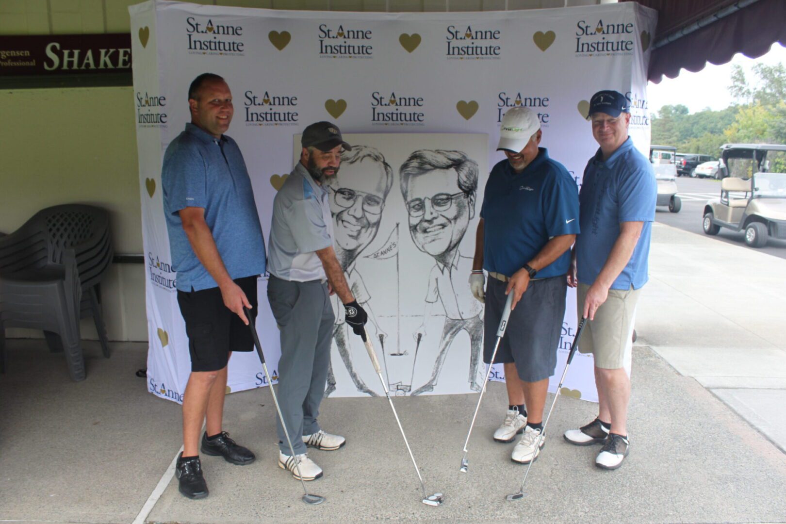 A group of men posing for a picture.