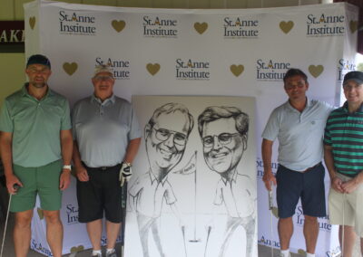 A group of men standing next to a caricature.