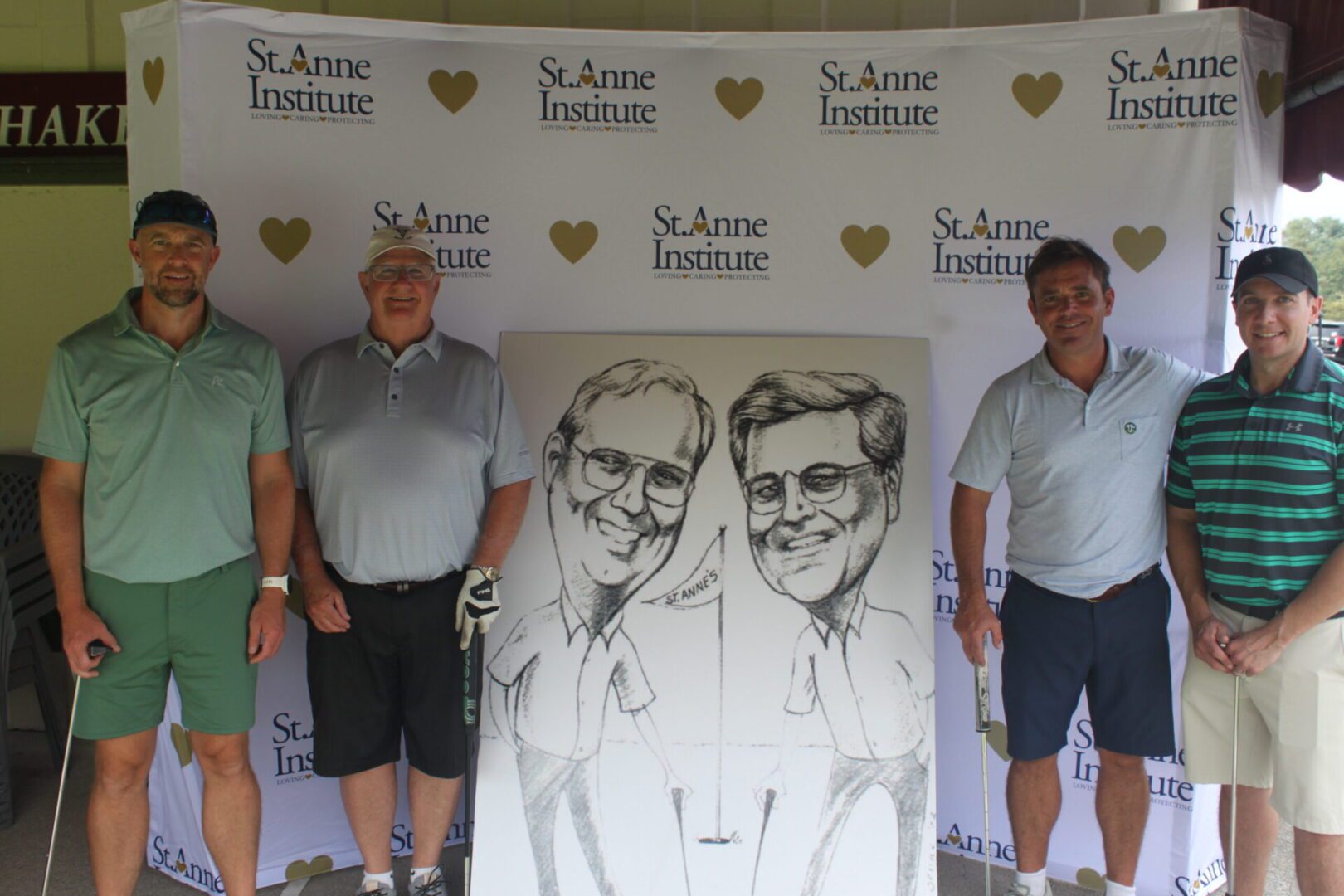 A group of men standing next to a caricature.