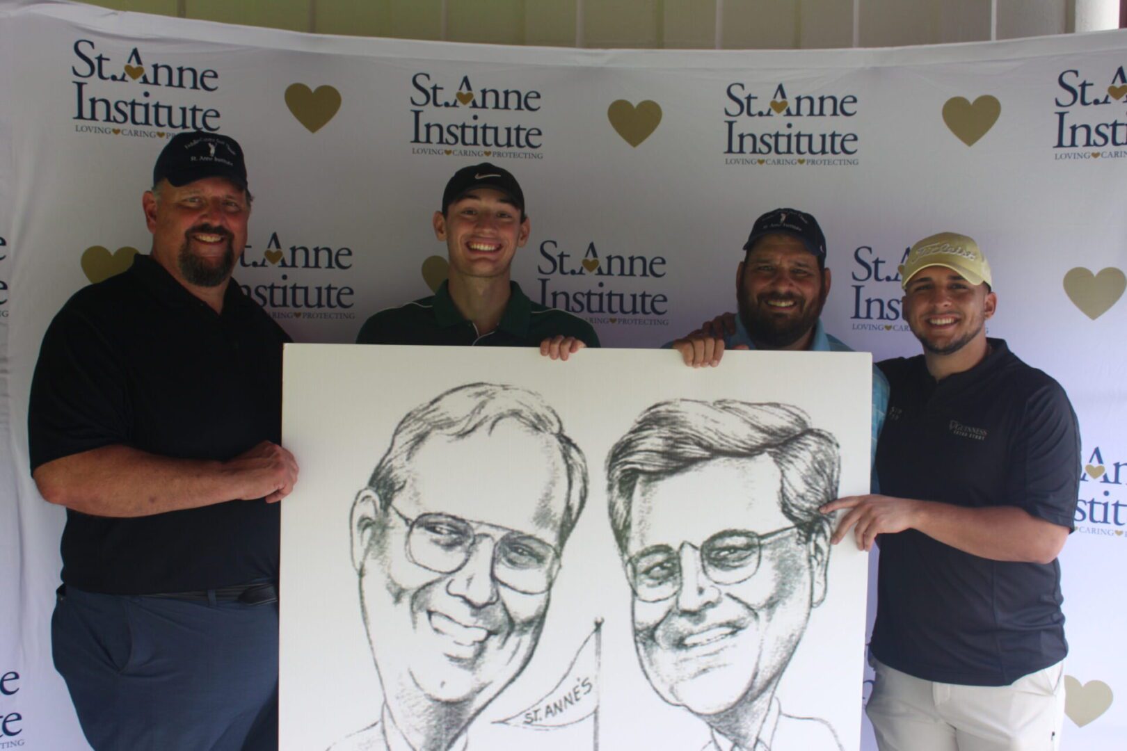 A group of men holding up a caricature.