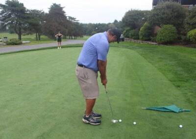 A man on a golf course.