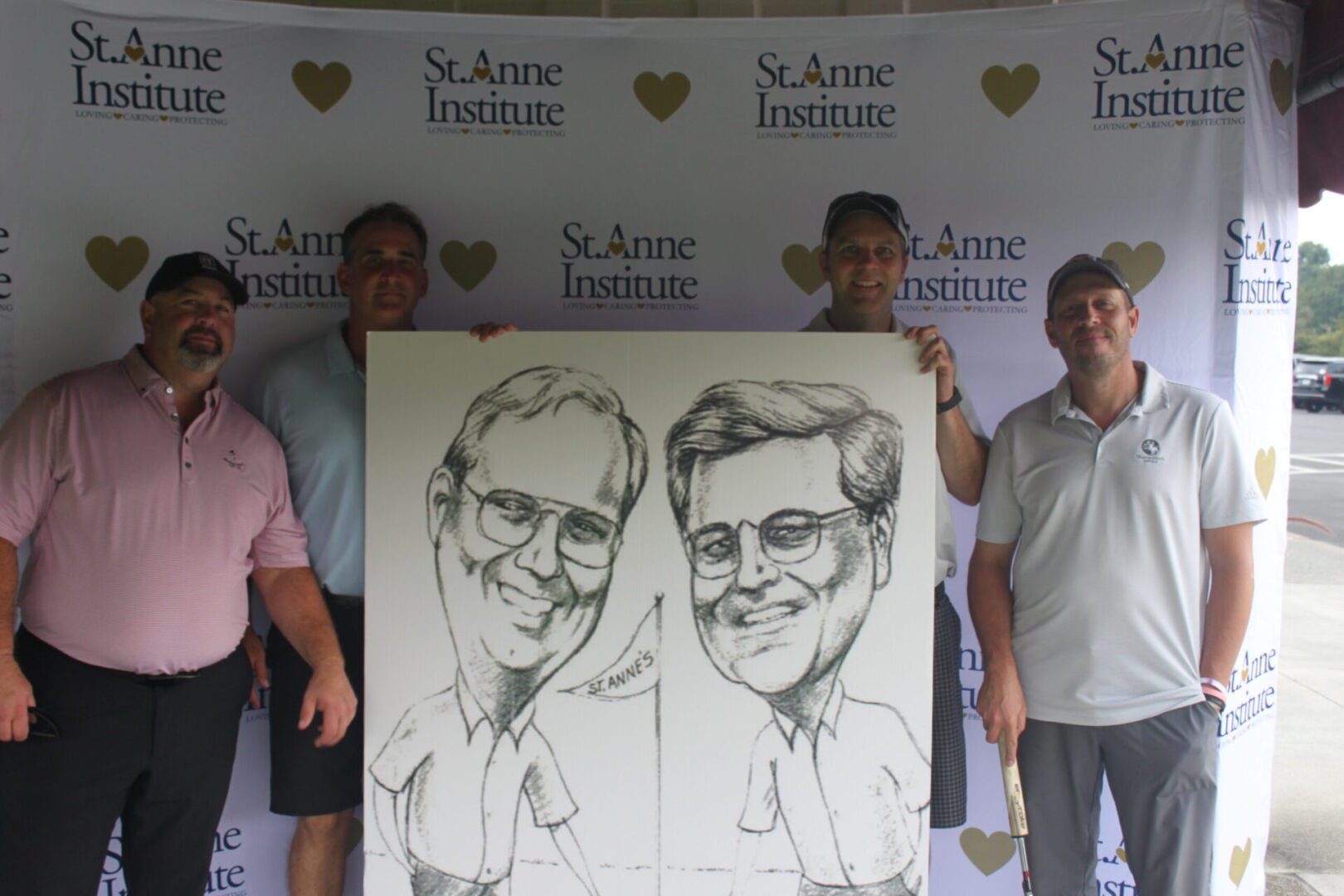 A group of men posing with a caricature.
