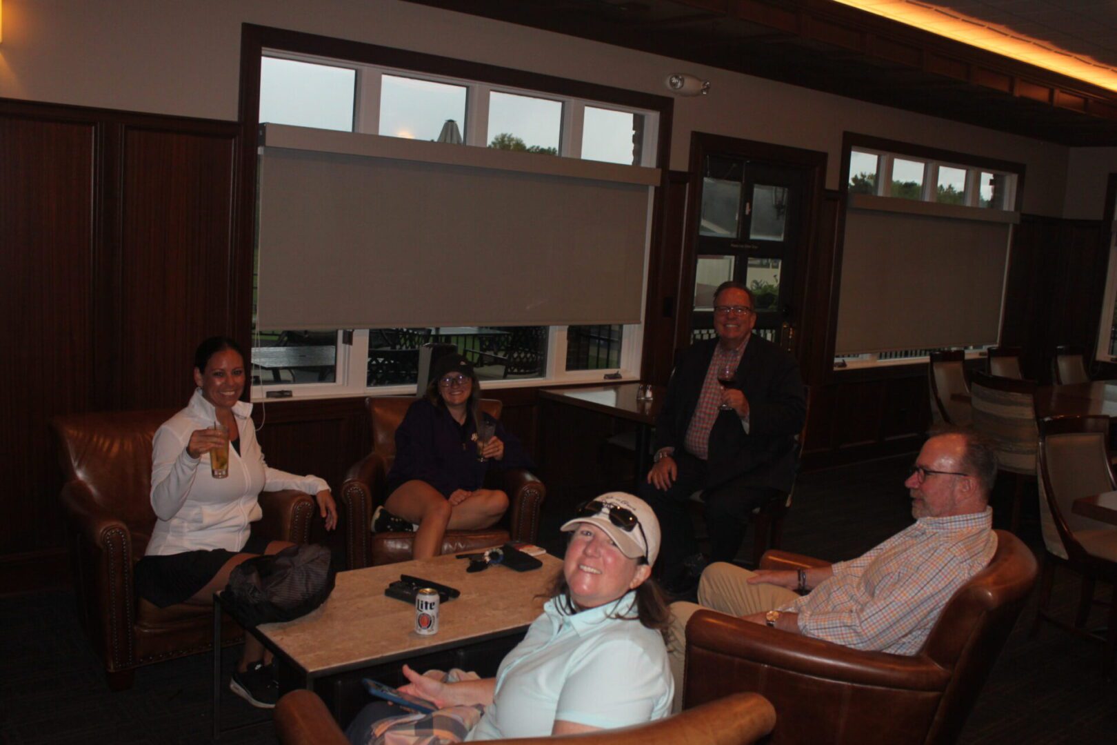A group of people sitting in a room.