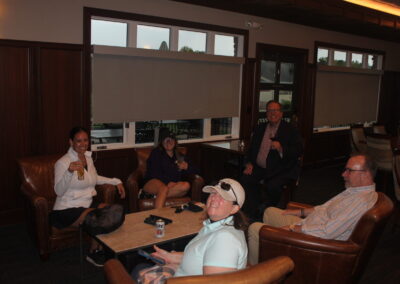 A group of people sitting in a room.