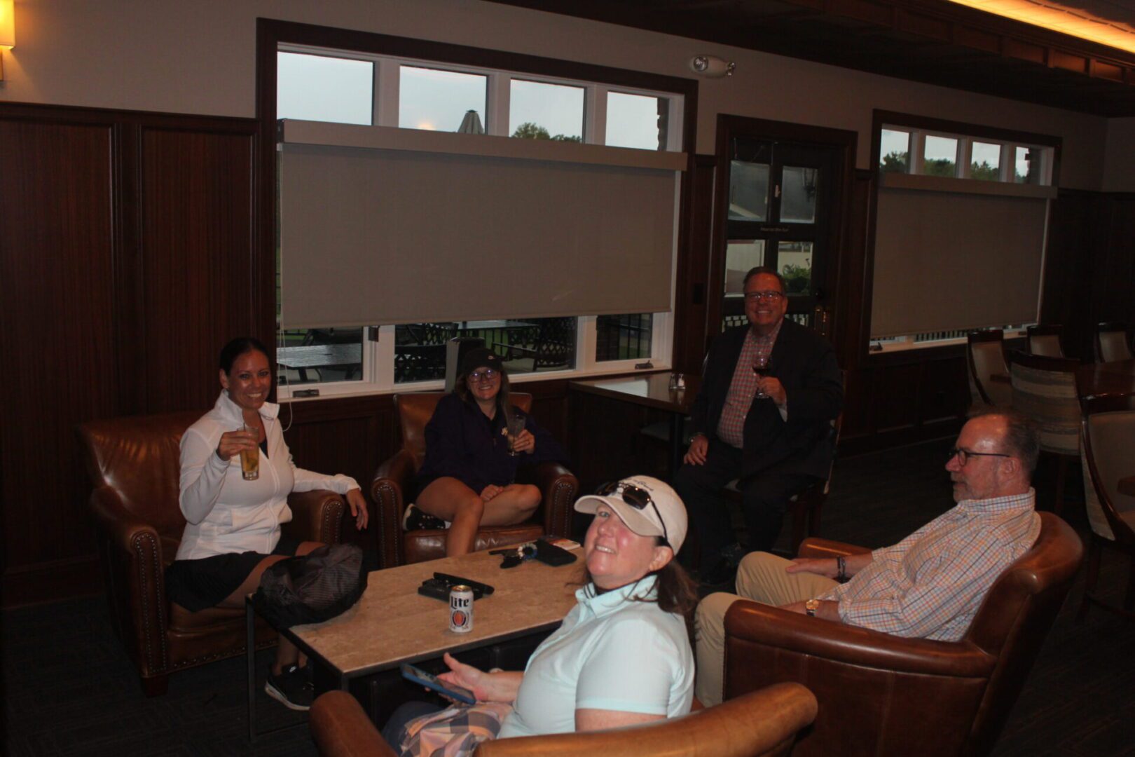A group of people sitting in a room.