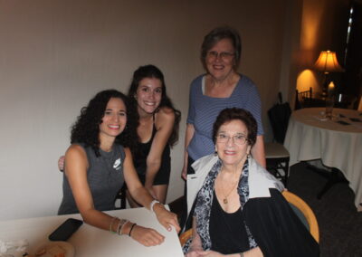 A group of women posing for a picture.