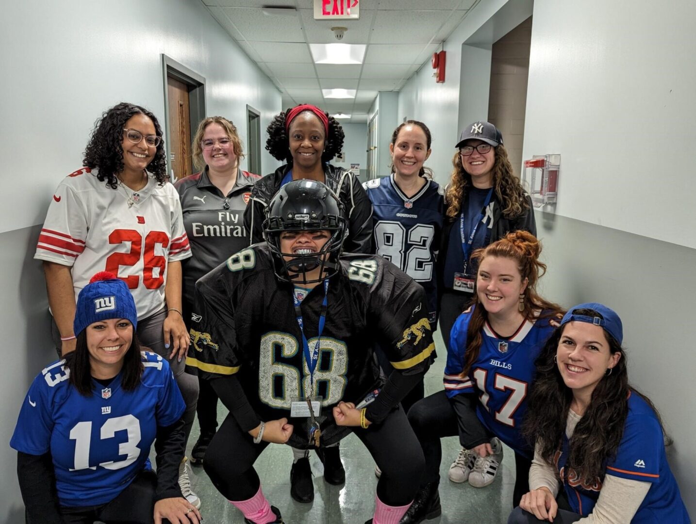 A sports team along with player and coach