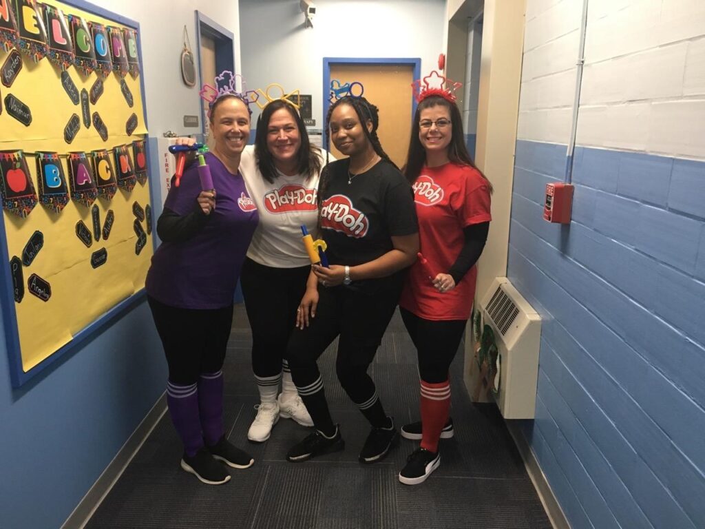 Four people on the hallway