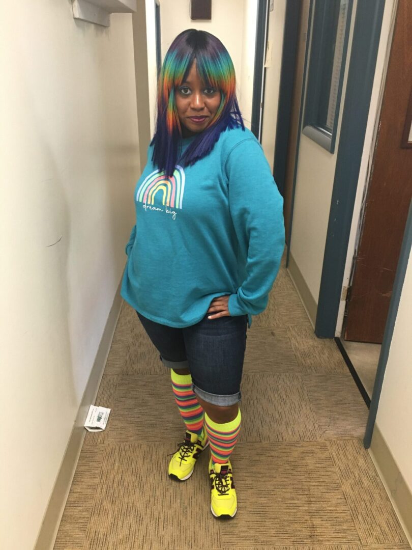 A woman with rainbow hair