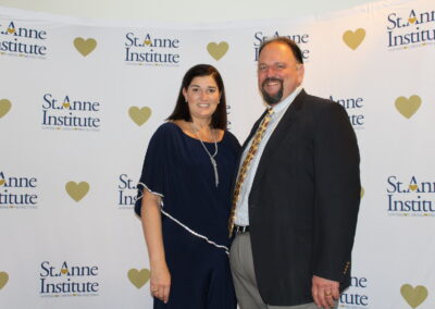 A man and woman posing for a photo.