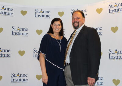 A man and woman posing for a photo.