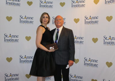 A man and a woman posing for a picture.