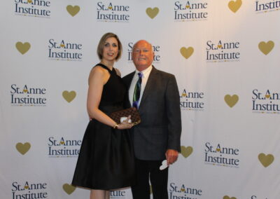 A man and woman posing for a photo.