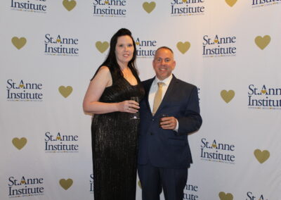 A man and woman posing for a picture.