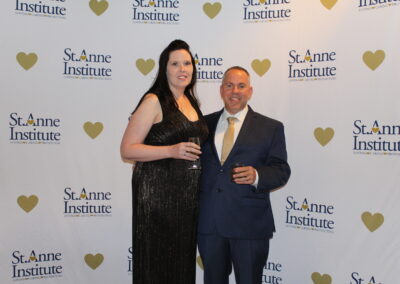 A man and woman posing for a picture.