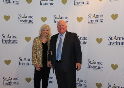 A man and woman posing for a picture.