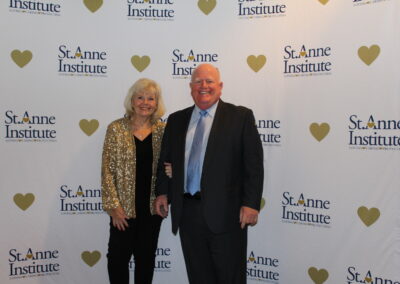 A man and woman posing for a photo.