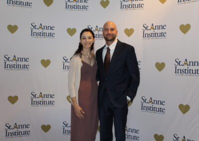 A man and woman posing for a photo.