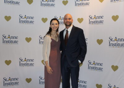 A man and woman posing for a picture.