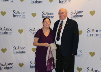 A man and a woman posing for a picture.