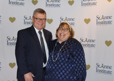 A man and a woman posing for a picture.