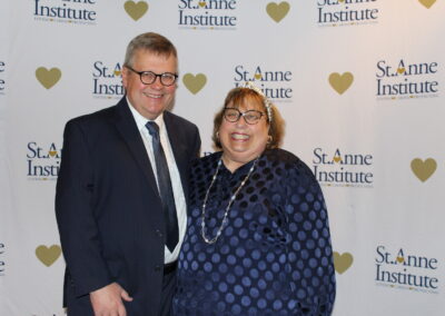 A man and a woman posing for a picture.