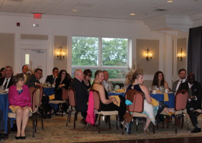 A group of people sitting at a table.