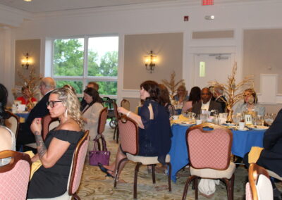 A group of people sitting at a table.