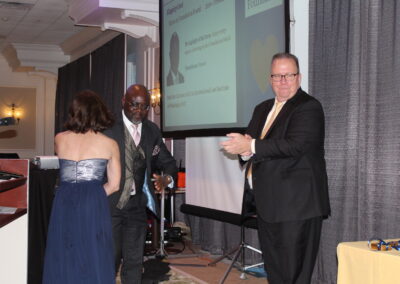 A man in a suit and a woman in a dress.