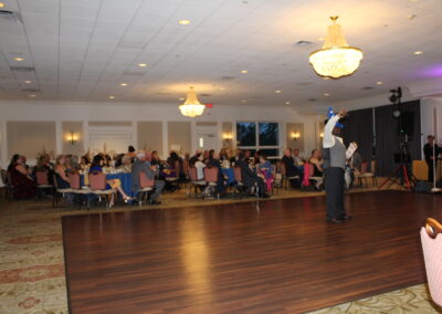 A large room with a dance floor.