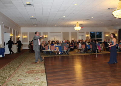 A large room with a dance floor.