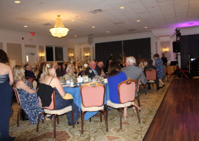 A group of people sitting at a table.