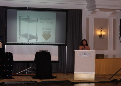 A woman standing at a podium.