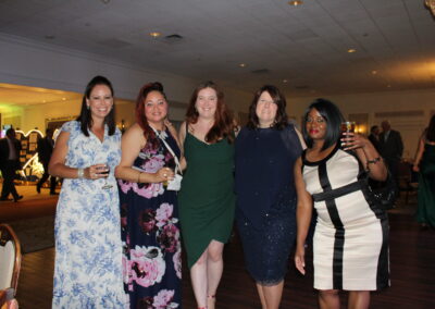 A group of women posing for a picture.