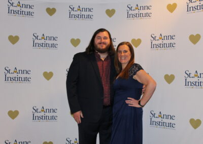 A man and woman posing for a picture.