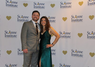 A man and woman posing for a picture.