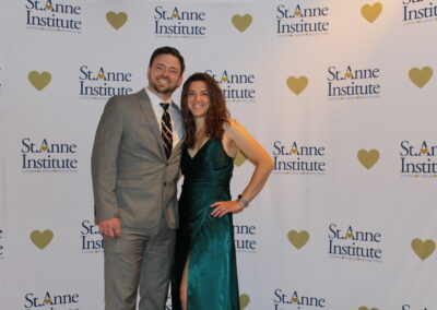 A man and woman posing for a picture.