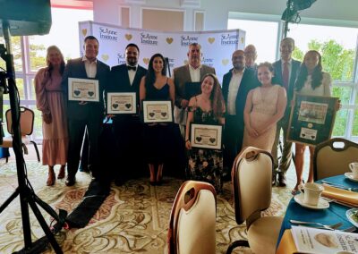 St. Anne Institute award ceremony group photo.